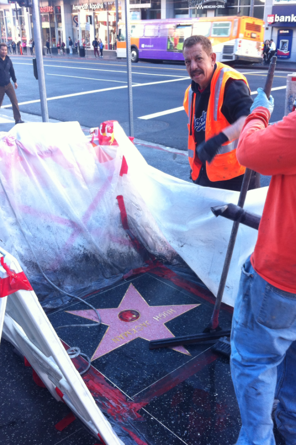 The finishing touches to HUGH JACKMAN's star on The Hollywood Walk of Fame.